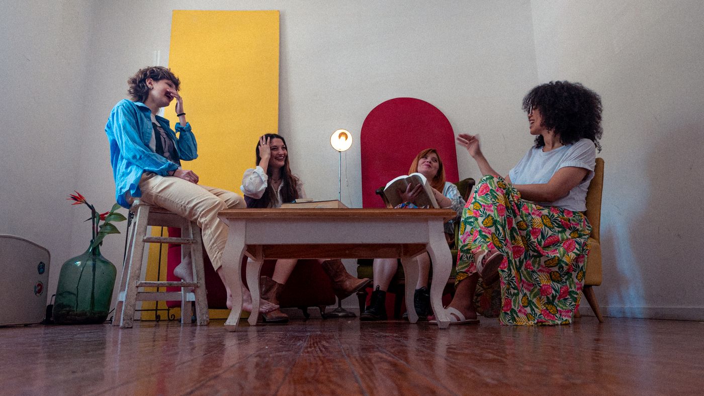 Small group talking around a table