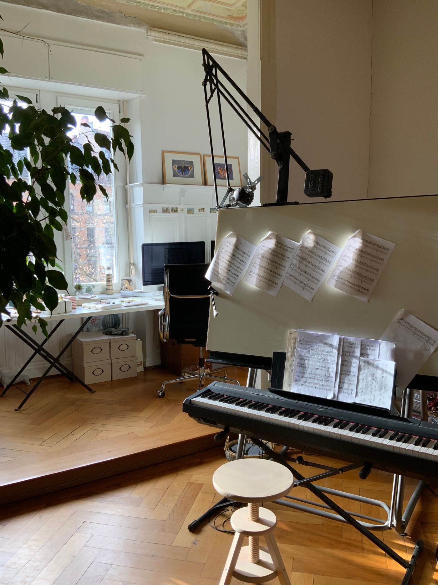 Keyboard stool and score stand sharing a home practice area