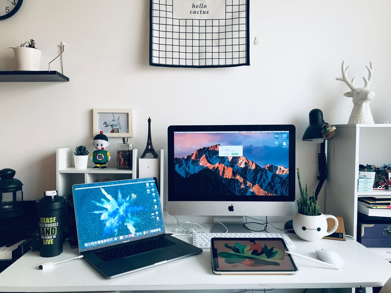 Desk, lamp, and bookshelves in a home workspace
