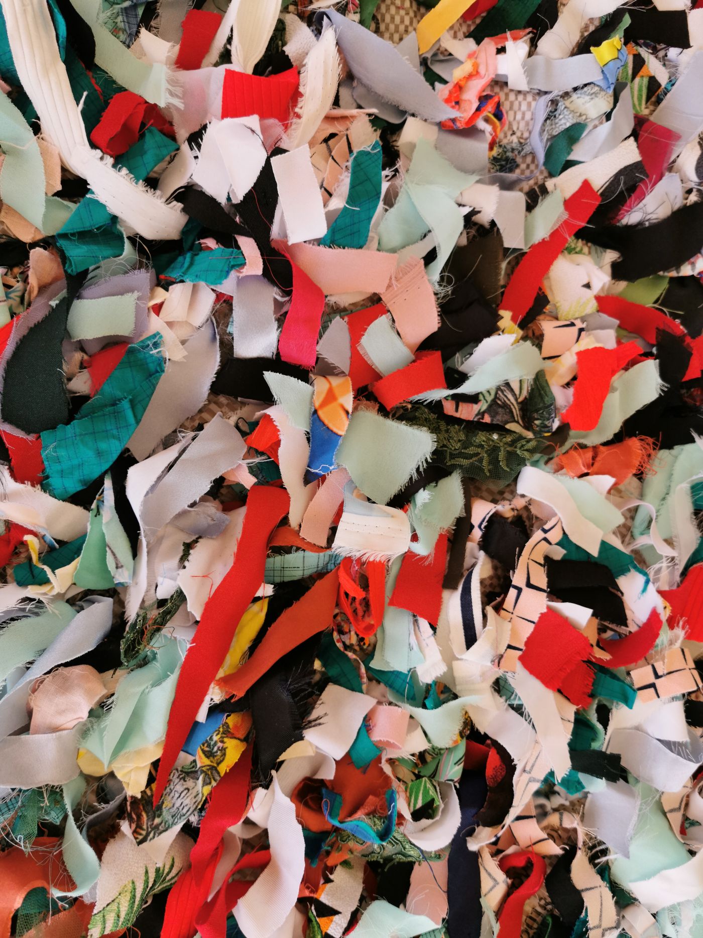 Mixed fabric offcuts showing varied shapes and sizes