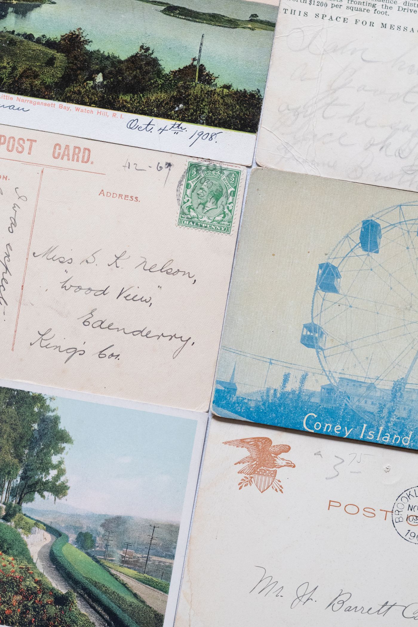 Vintage postcards showing both written and picture sides
