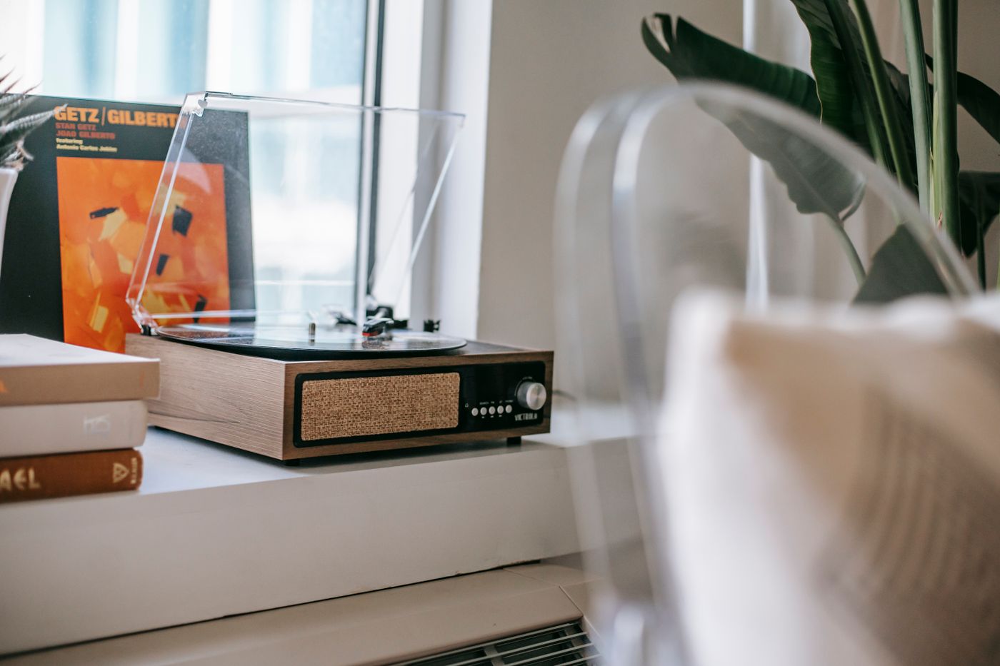 Record player set on a household cabinet