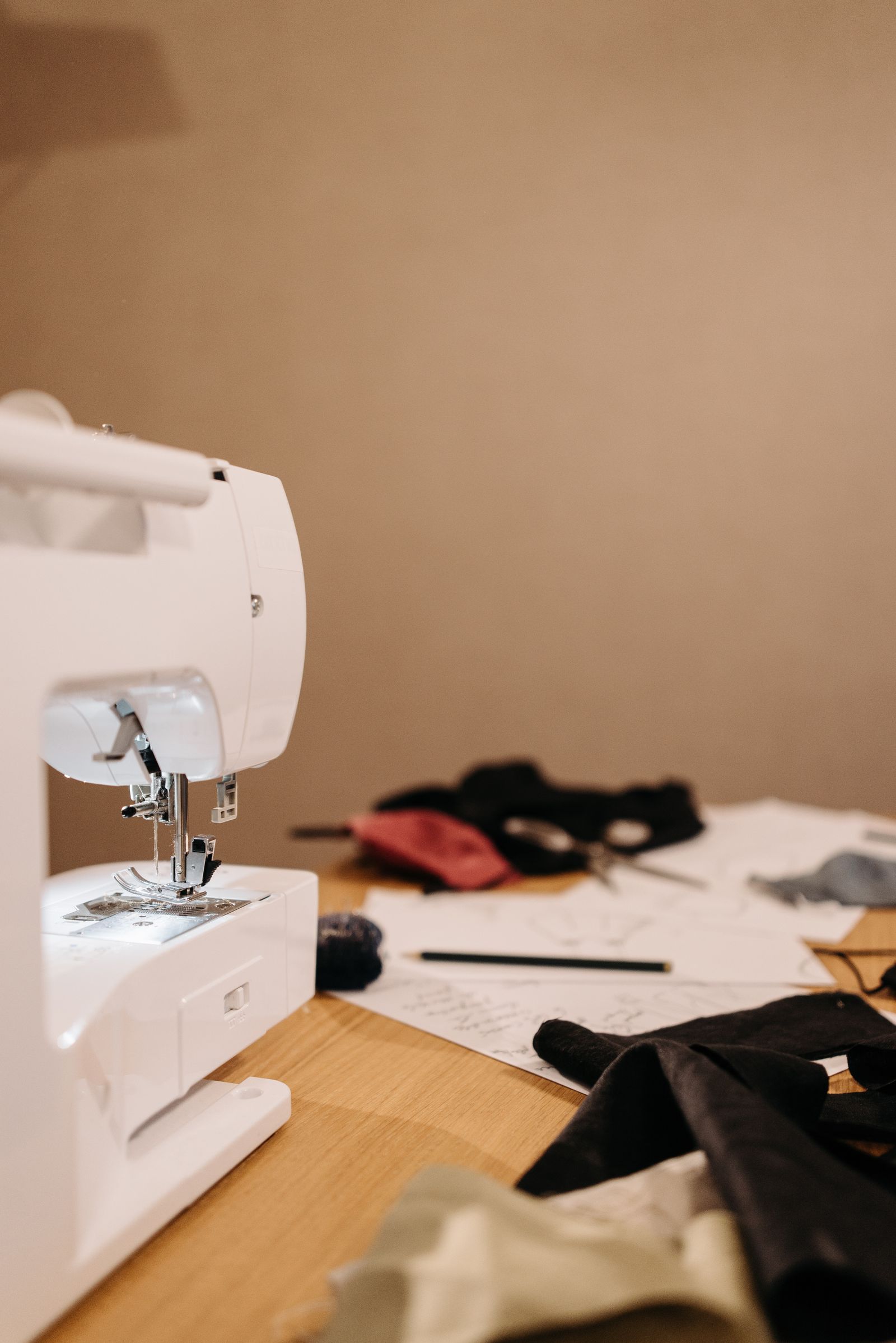 A Temporary Sewing-Machine Station at a Small Dining Table