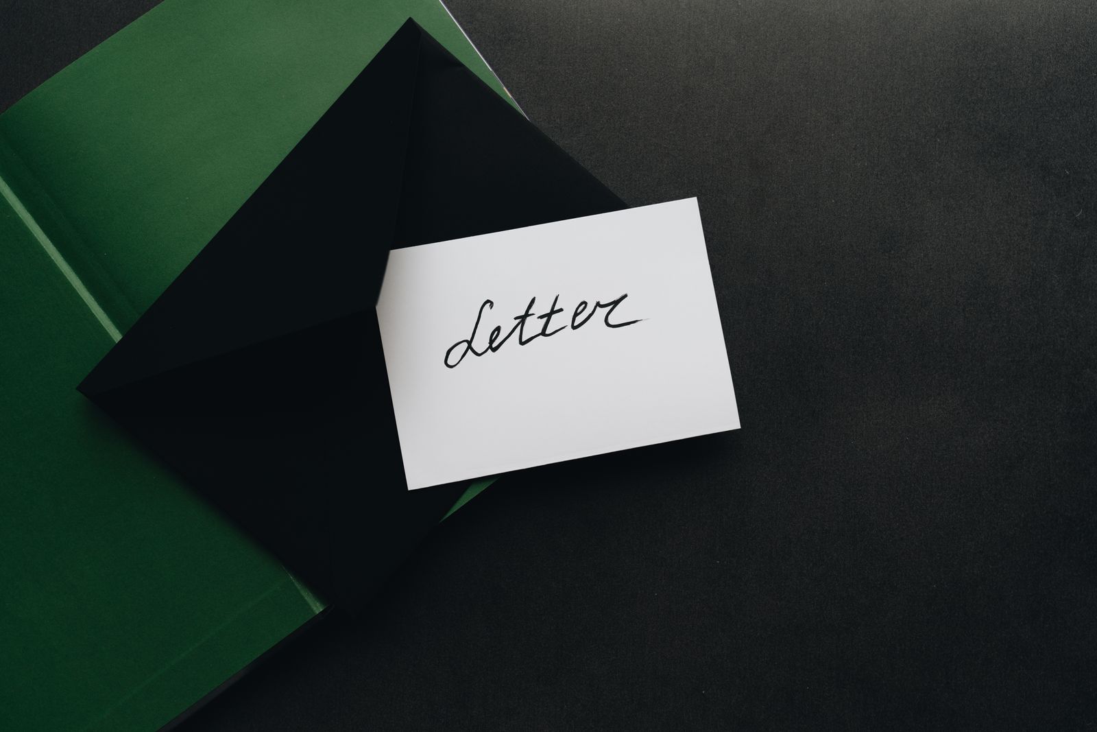 A white card marked Letter beside a dark envelope