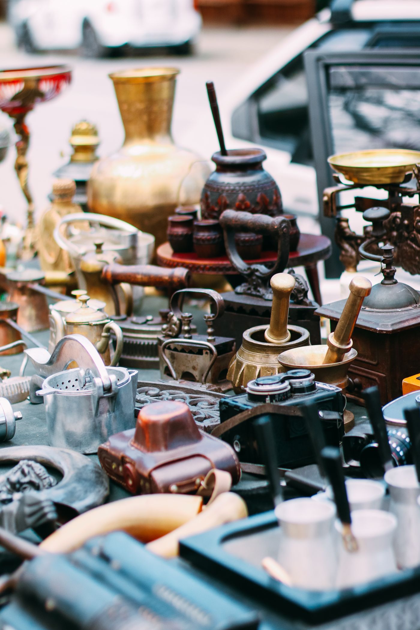 Small vessels and decor grouped on a market table