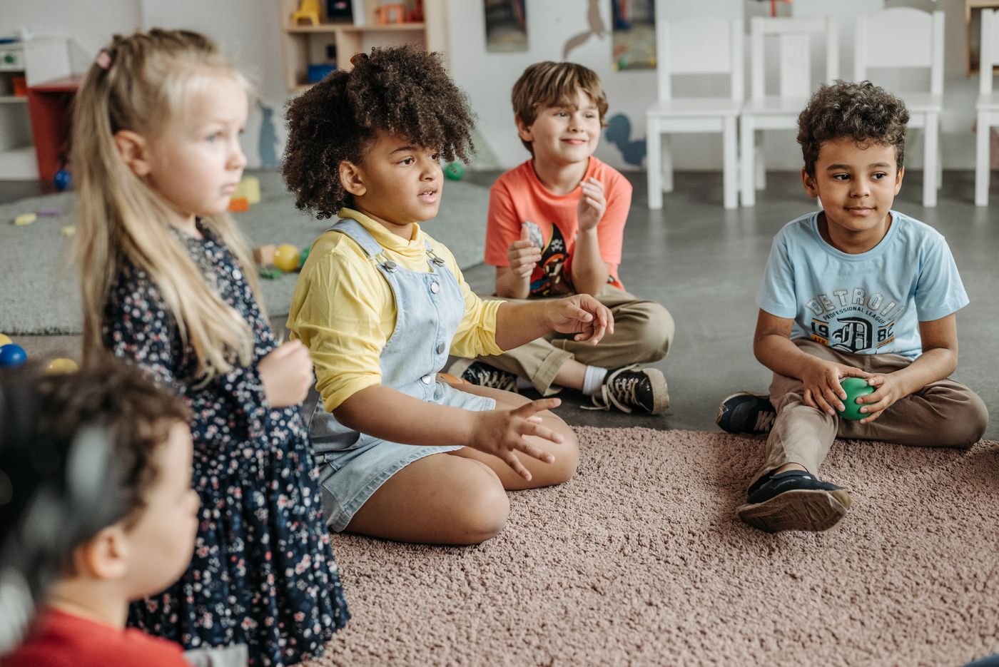 Children seated together for a group activity