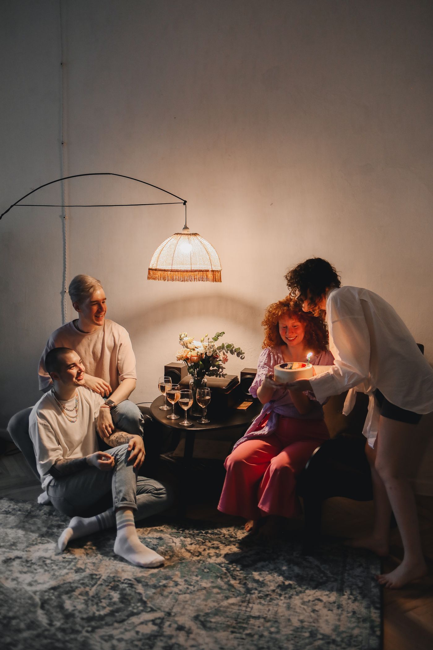 Wide view of a small group seated for conversation