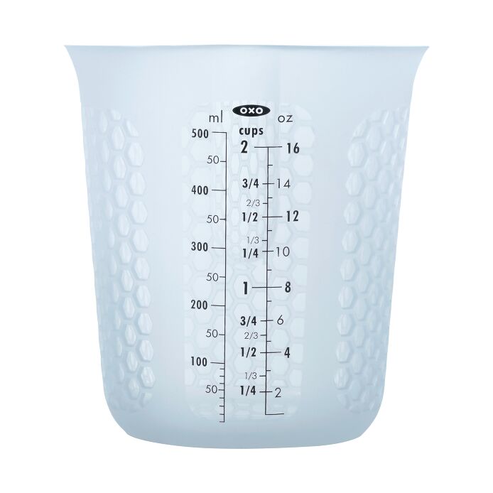OXO two-cup Squeeze and Pour silicone measuring cup with honeycomb exterior and black markings